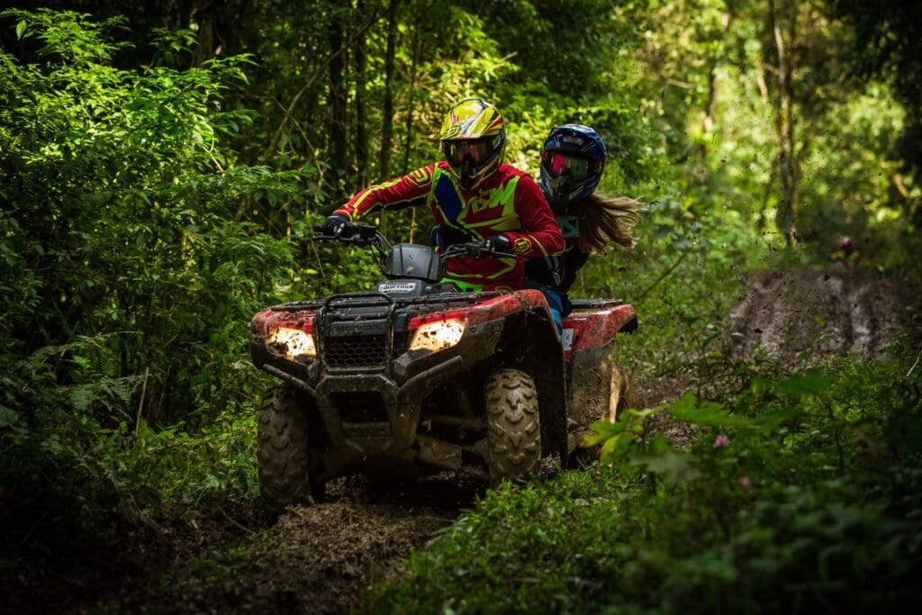 Man and woman Riding and ATV
