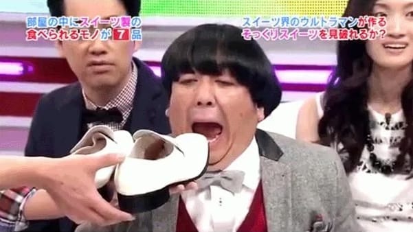 Man biting shoe on weird japan game show